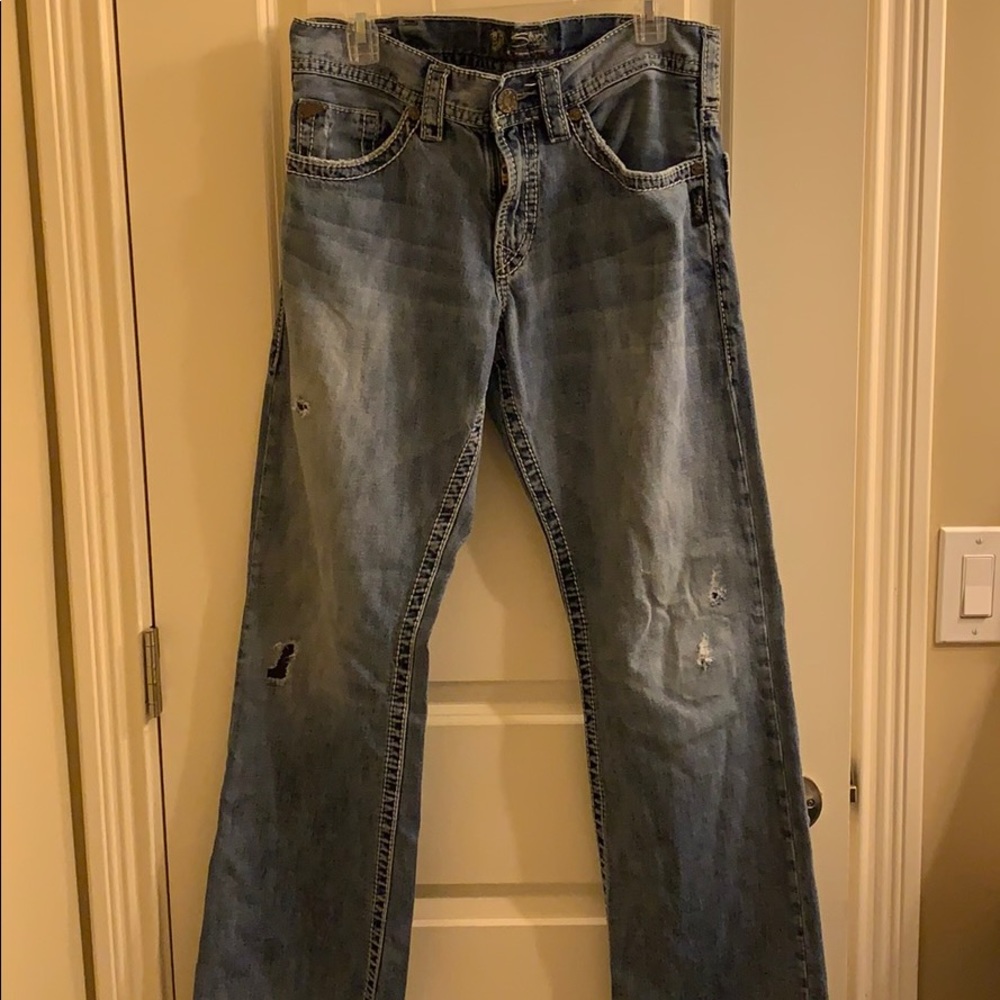 Silver jeans.  The style Zac.